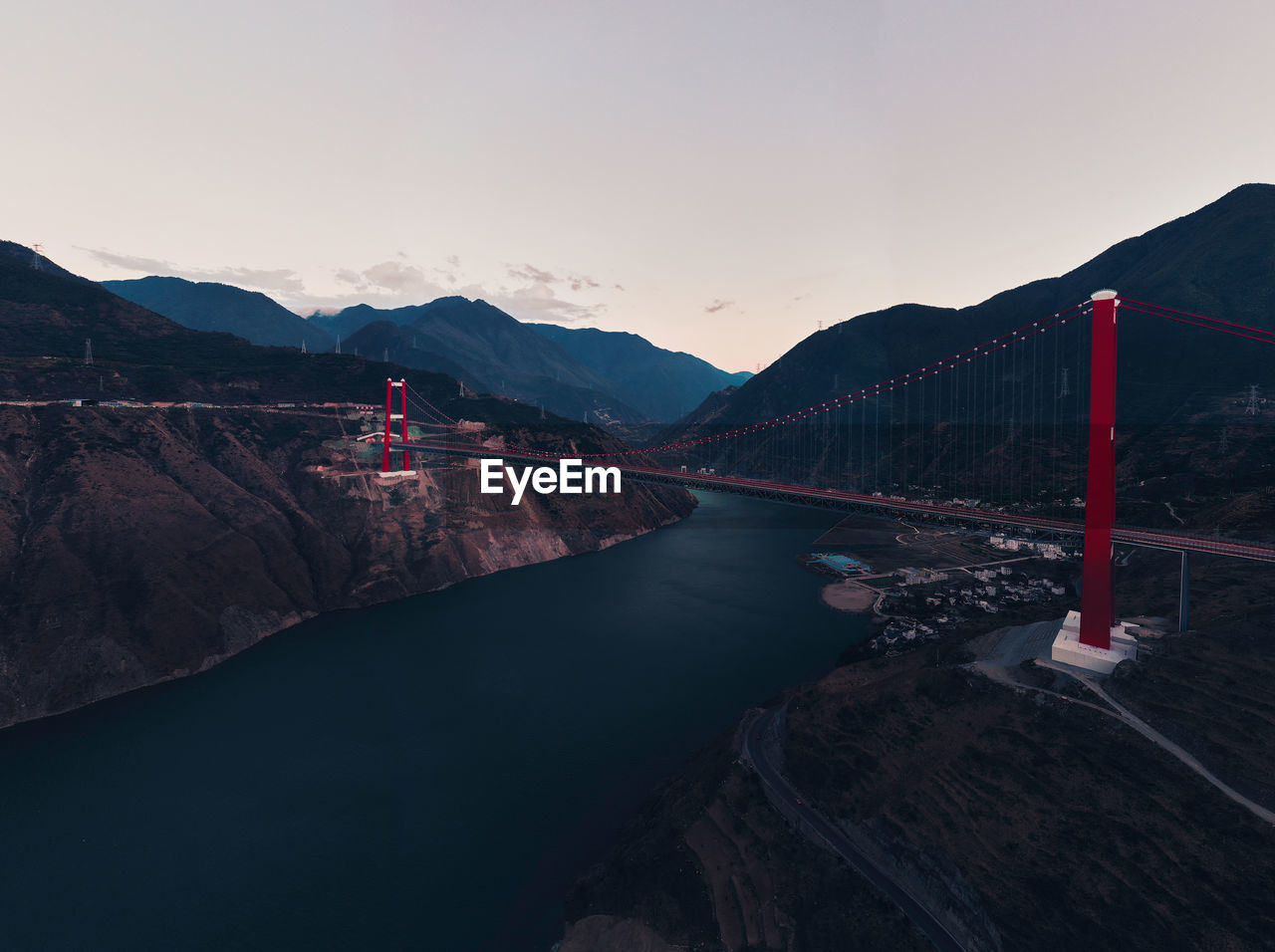 Bridge over river against sky