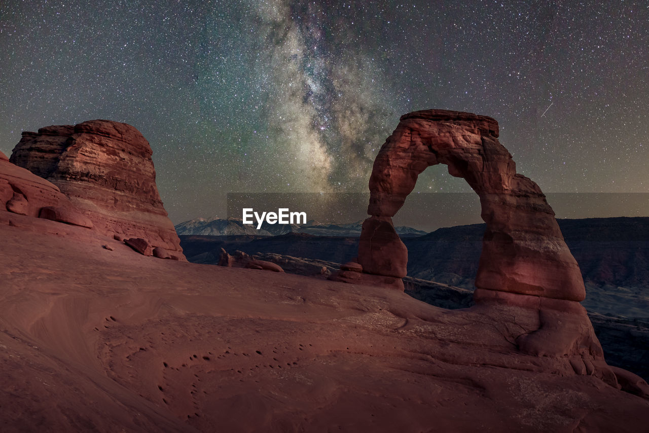 Aerial view of rock formations against sky