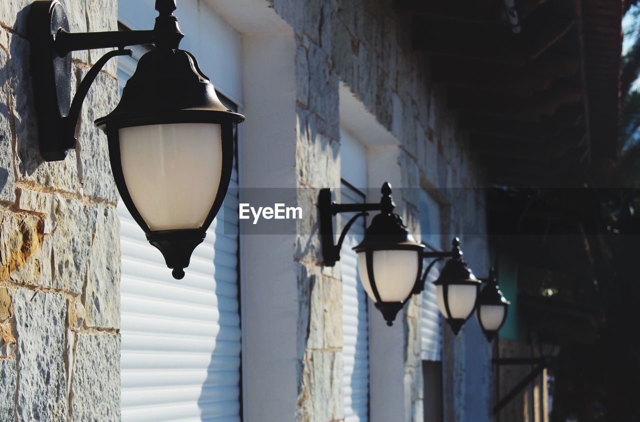 Low angle view of illuminated lamp