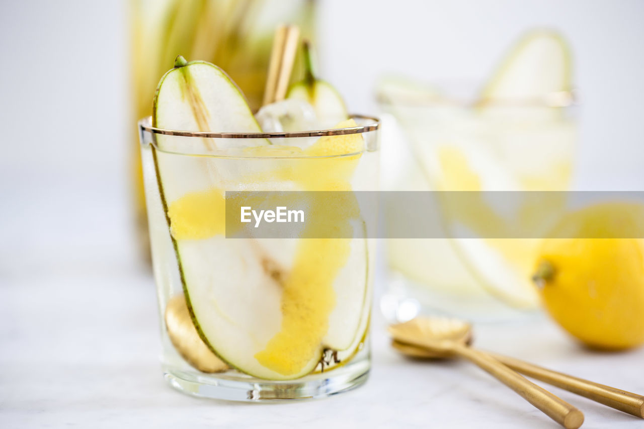 CLOSE-UP OF DRINK IN GLASS