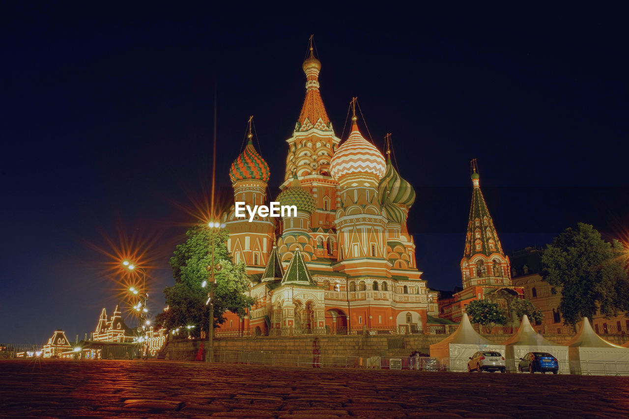 ILLUMINATED BUILDINGS AT NIGHT