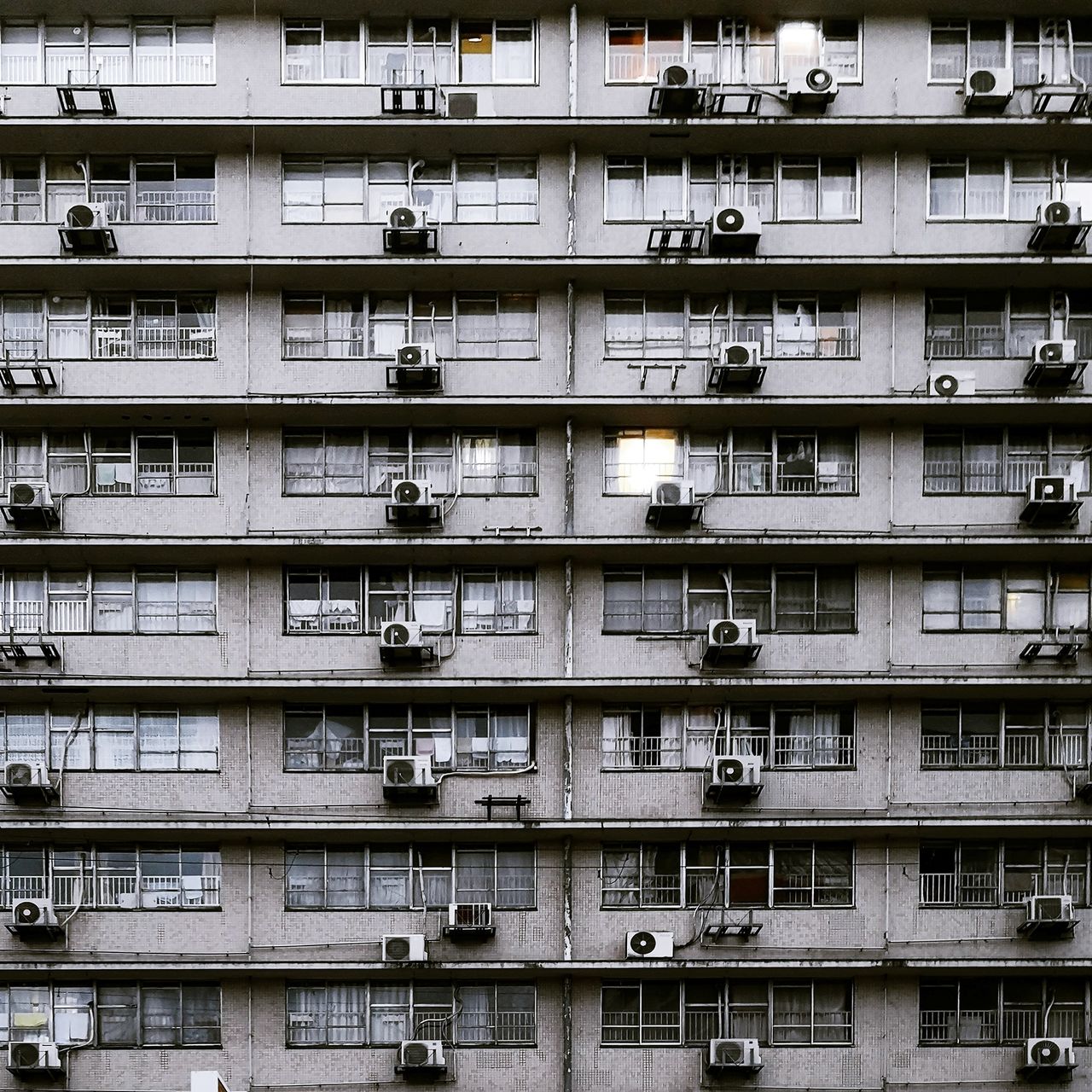 LOW ANGLE VIEW OF RESIDENTIAL BUILDING