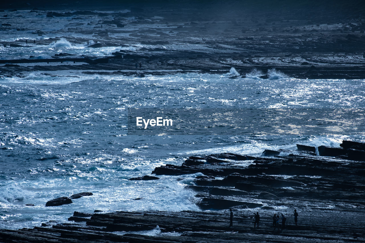 SCENIC VIEW OF FROZEN SEA AGAINST SKY