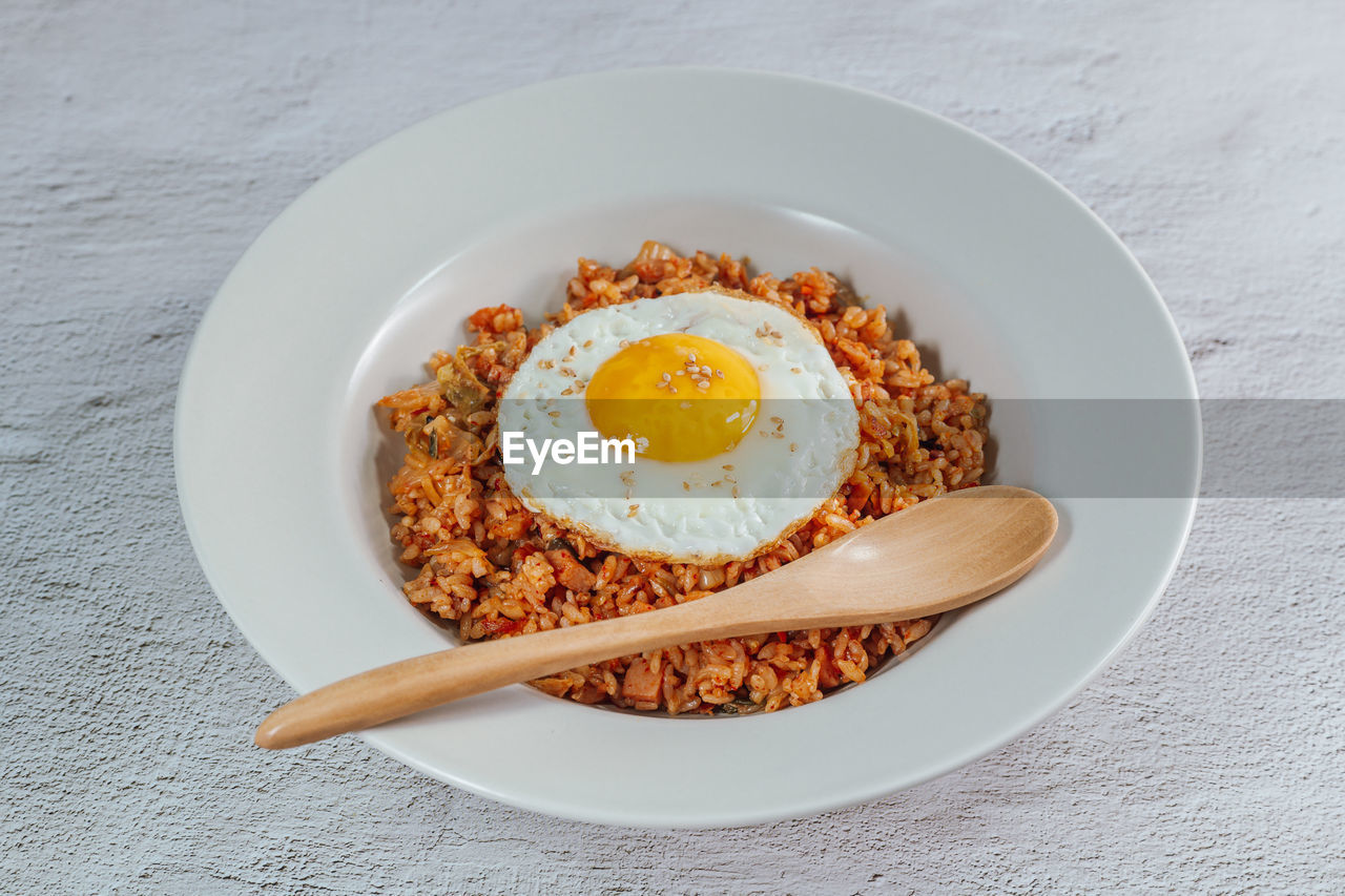 HIGH ANGLE VIEW OF BREAKFAST SERVED ON TABLE