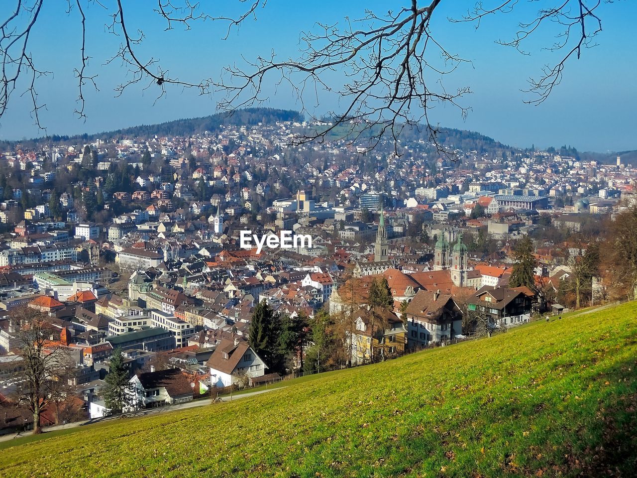 Aerial view of cityscape against sky