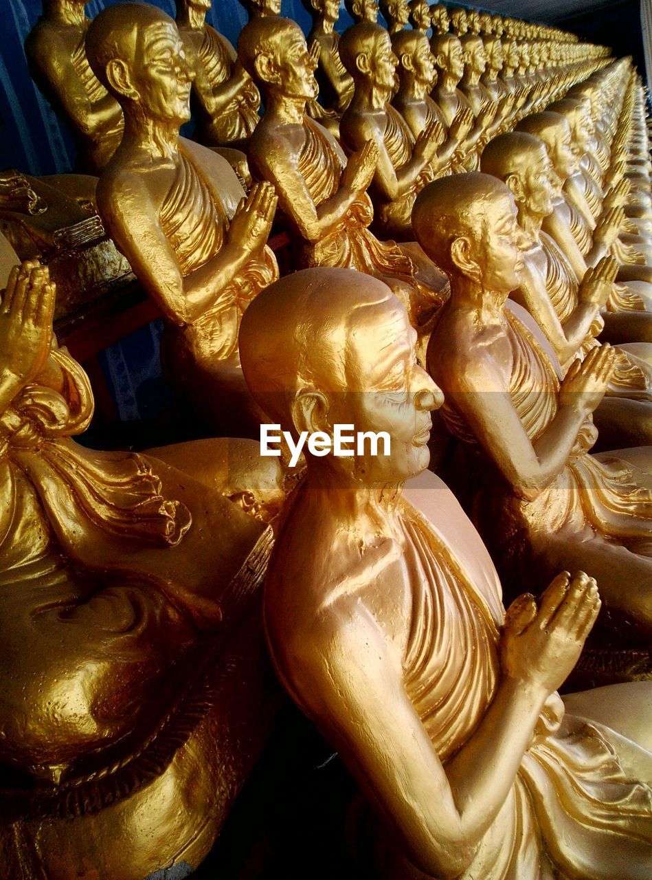 Full frame shot of human sculptures at thai temple