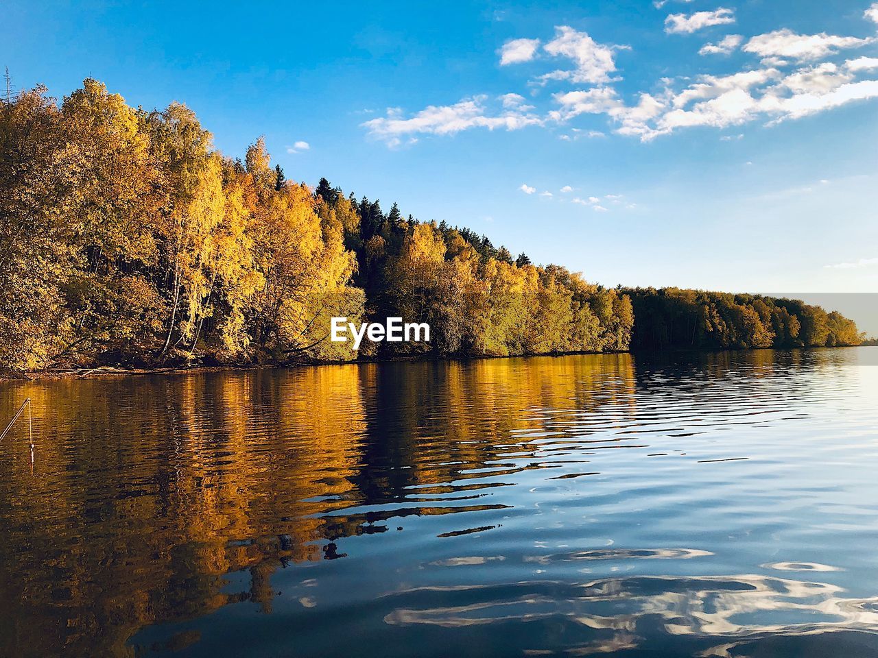 Scenic view of lake against sky during autumn