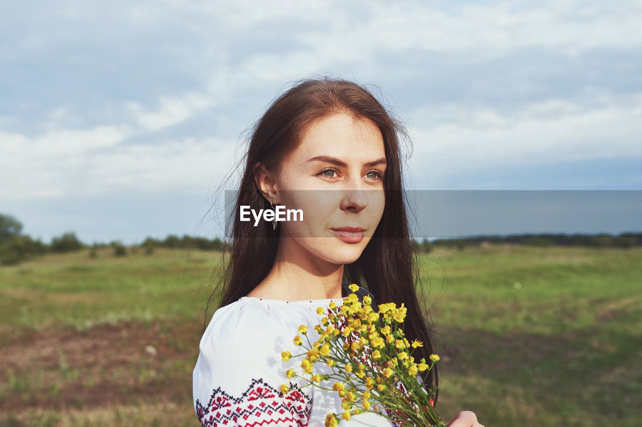 Beautiful caucasian woman in a folk costume person