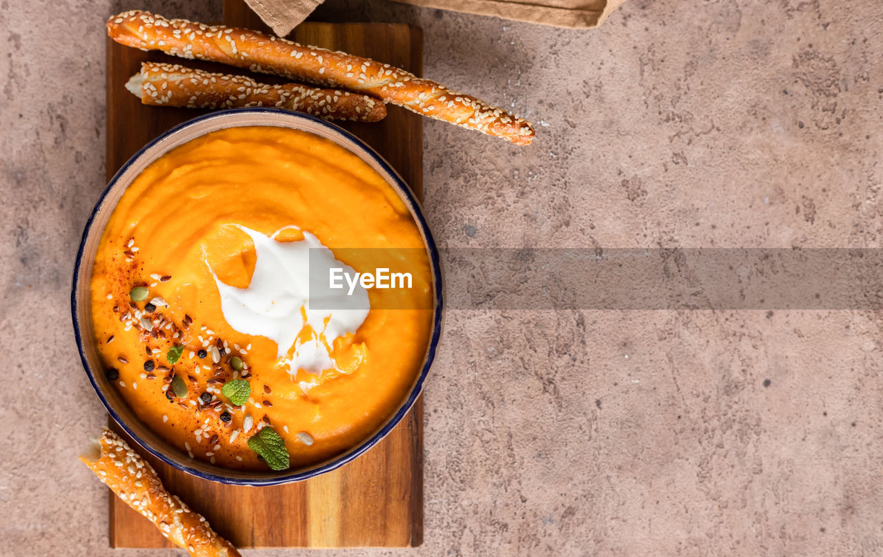 food and drink, food, healthy eating, dish, freshness, wellbeing, wood, plant, bowl, produce, high angle view, no people, spice, vegetable, meal, directly above, kitchen utensil, studio shot