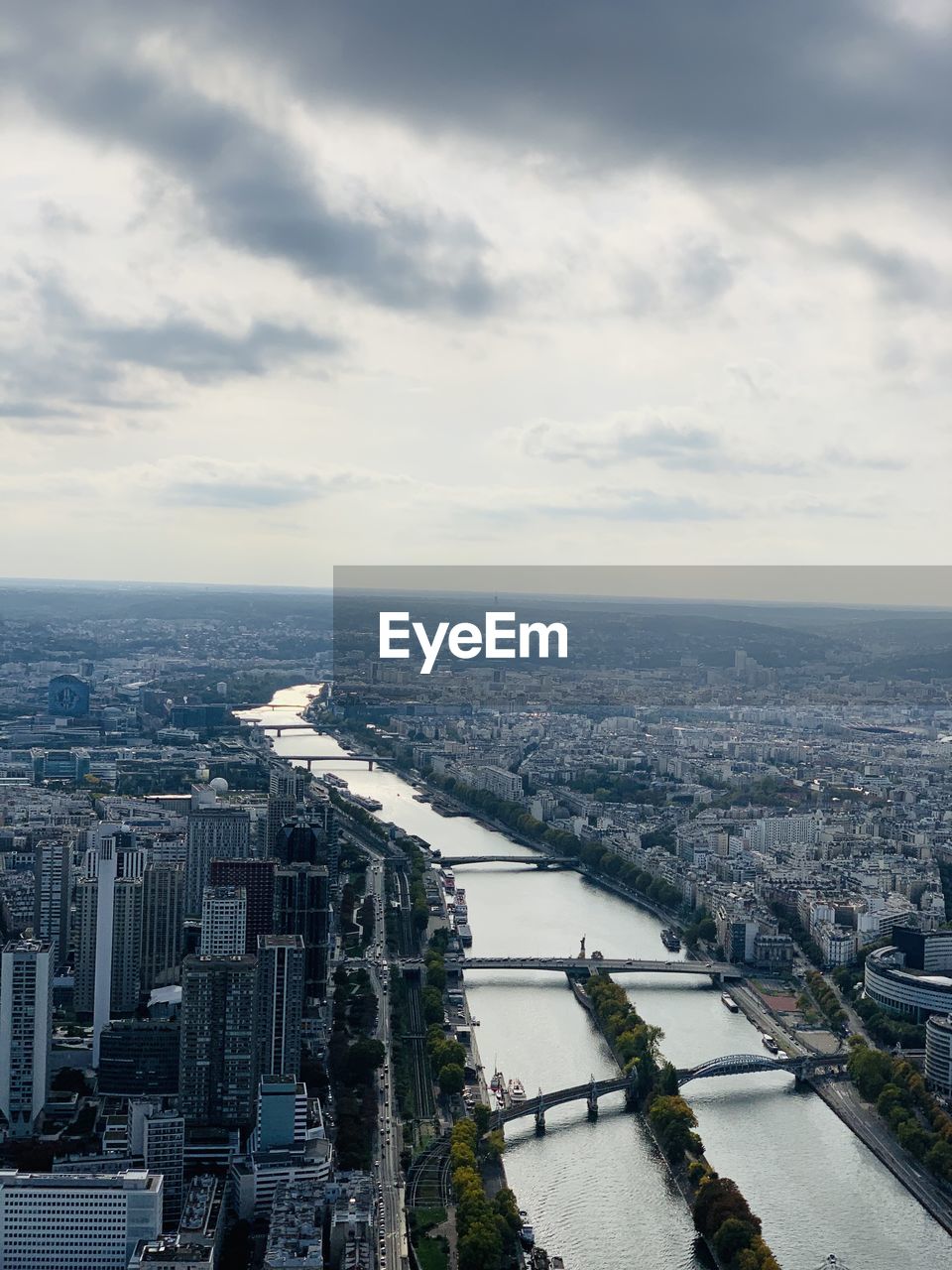 High angle view of river amidst buildings in city