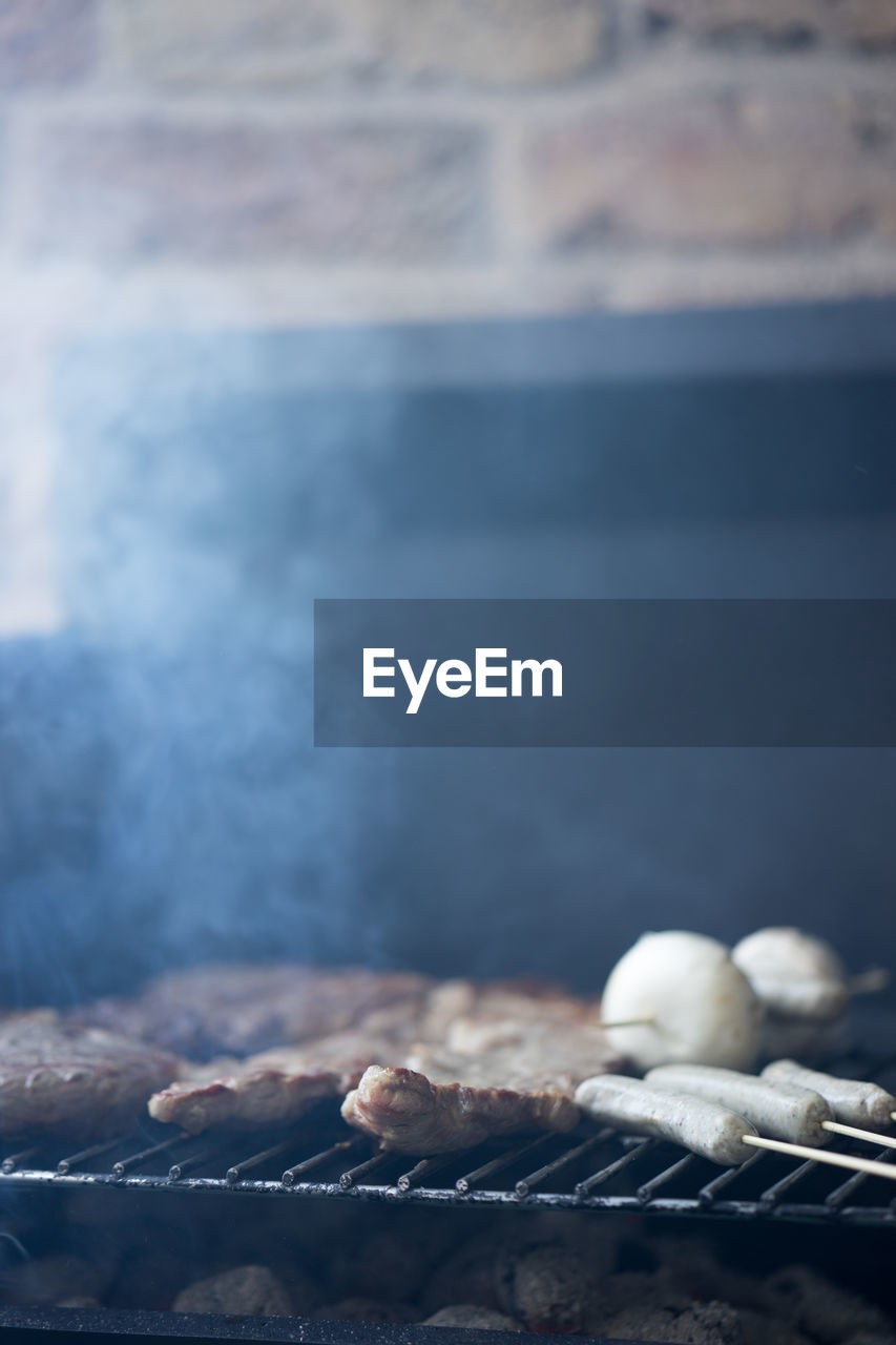 Close-up of food on barbecue grill