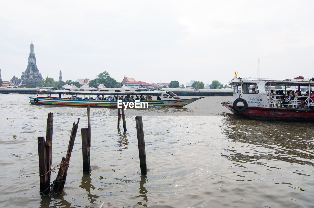 BOATS IN RIVER