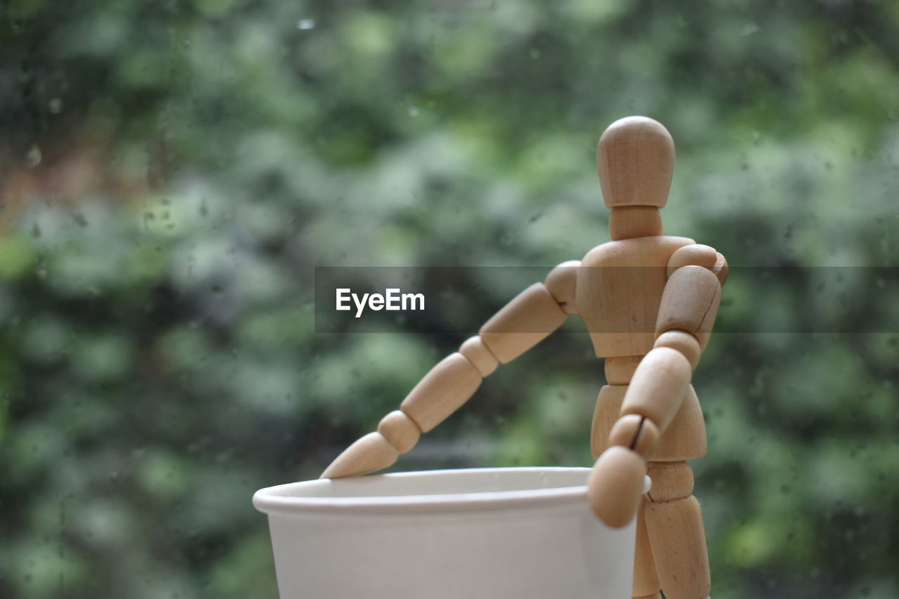 Close-up of stuffed toy on wood