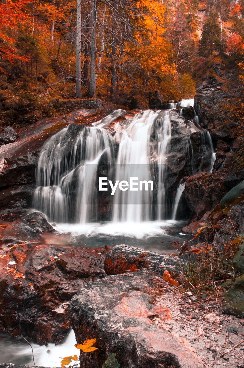 A waterfall in autumn