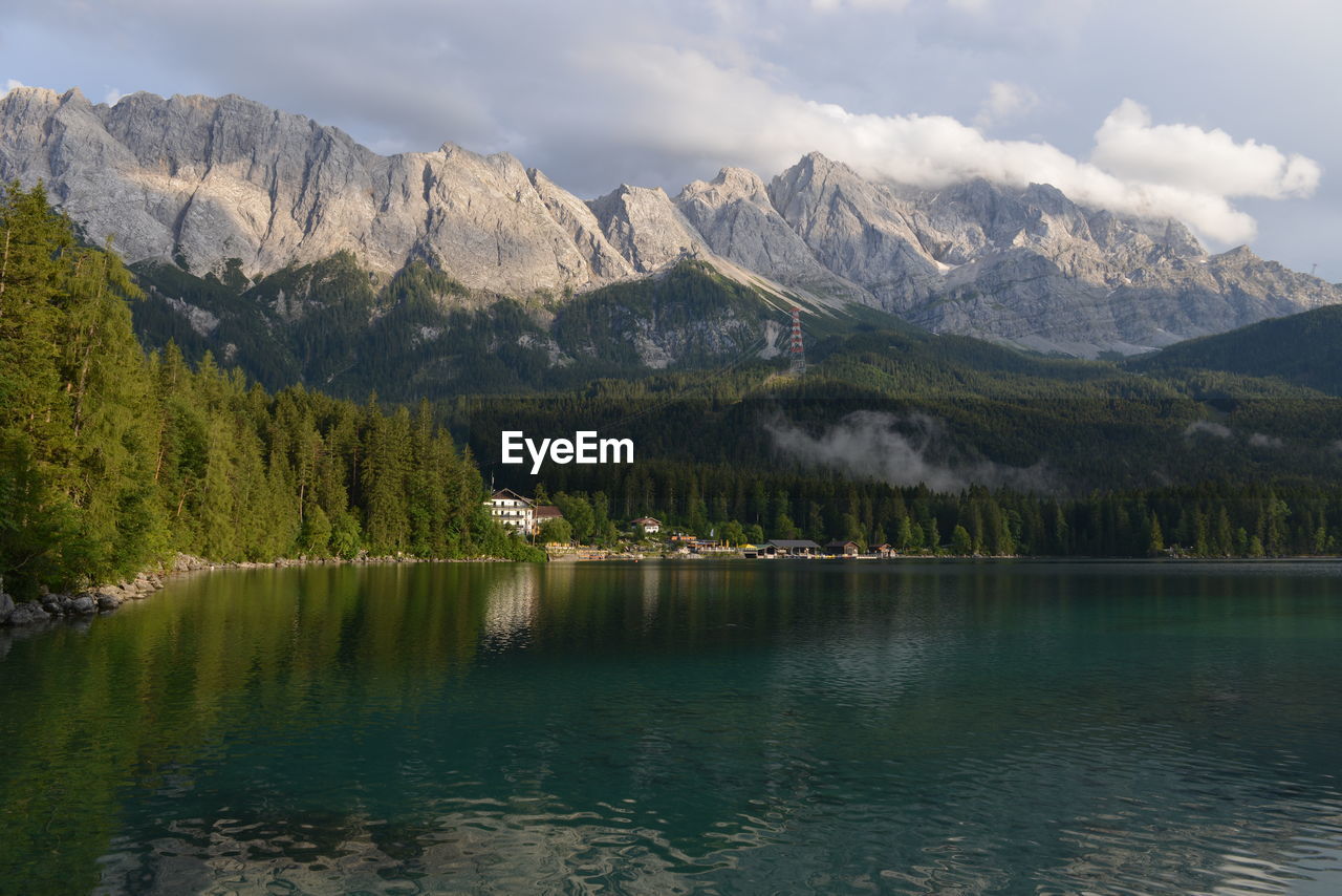 SCENIC VIEW OF LAKE AGAINST MOUNTAINS