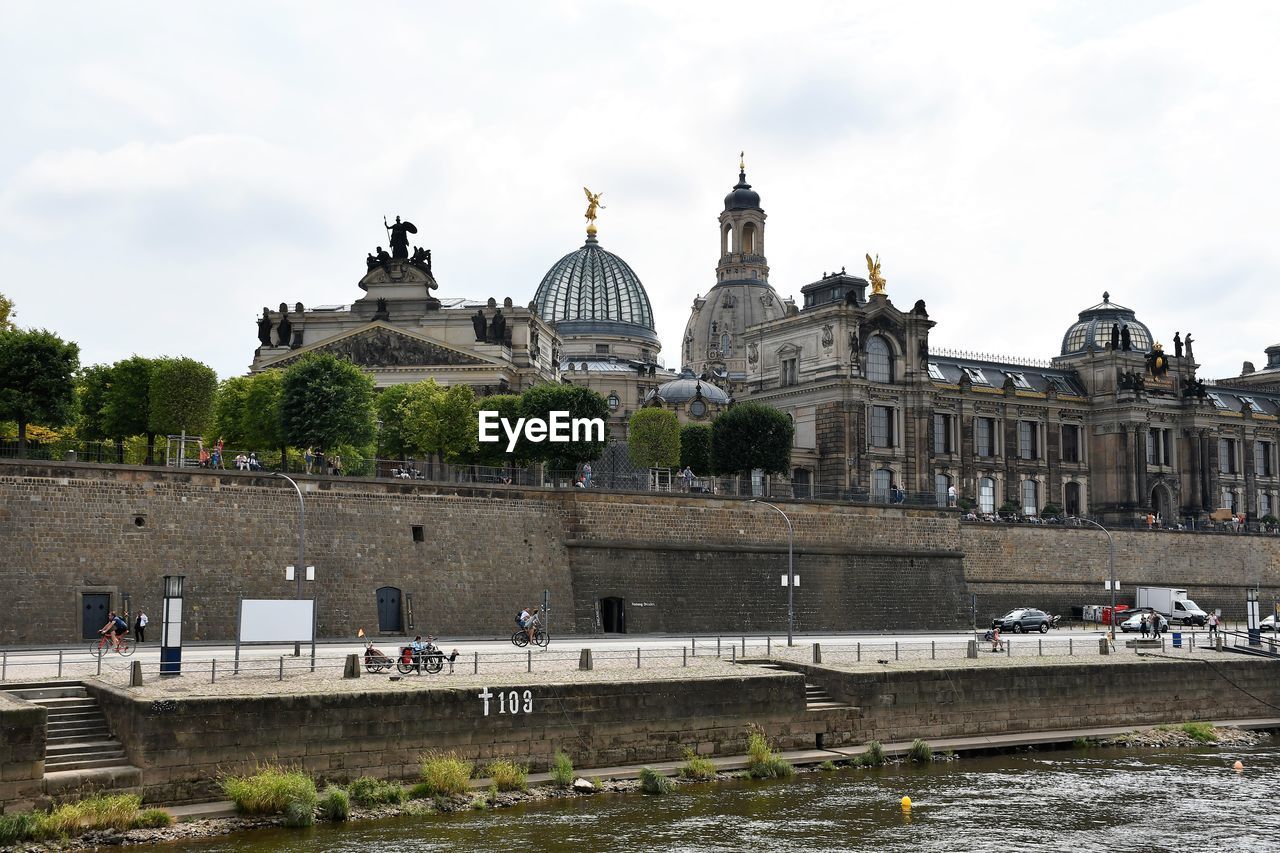 architecture, built structure, building exterior, travel destinations, travel, sky, landmark, tourism, history, religion, city, the past, dome, water, nature, place of worship, building, château, belief, cloud, spirituality, river, outdoors, government, day, group of people, waterway, palace, tourist, transportation, politics and government