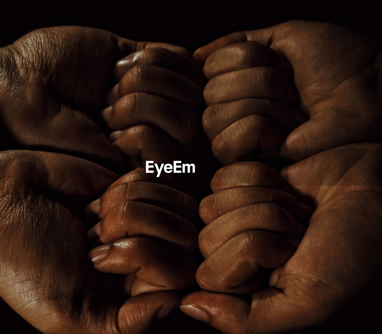 Cropped image of hands with sweat