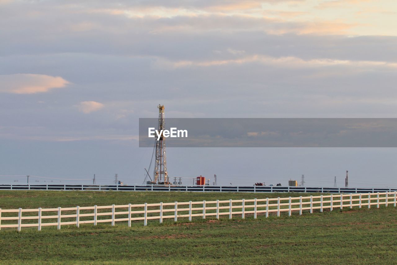 Drilling rig and rail fence