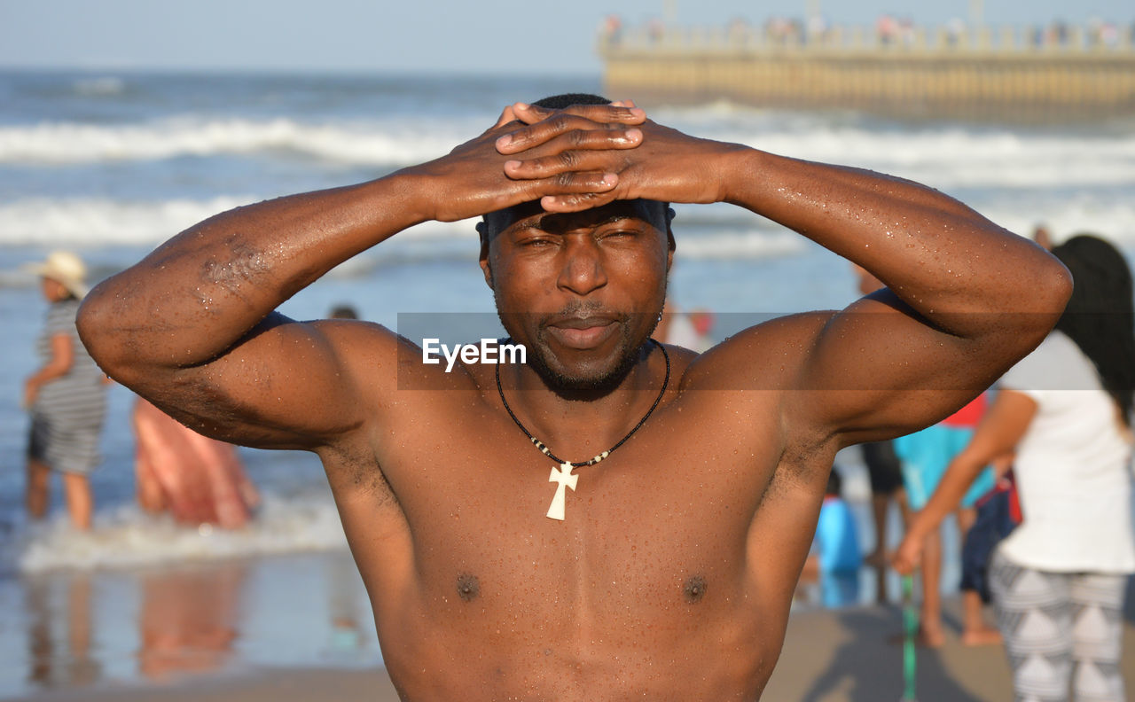 Close-up of shirtless man in water