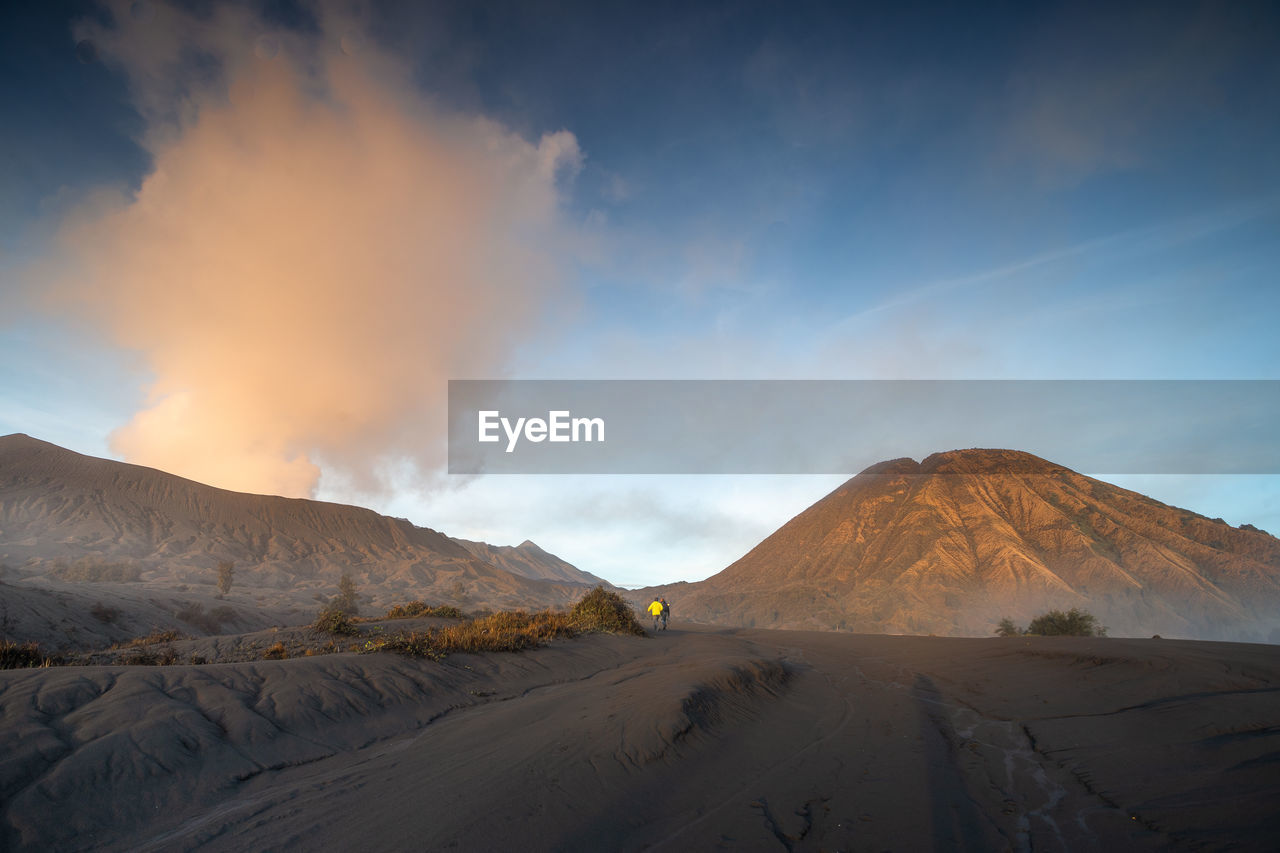 Panoramic view of snowcapped mountains against sky