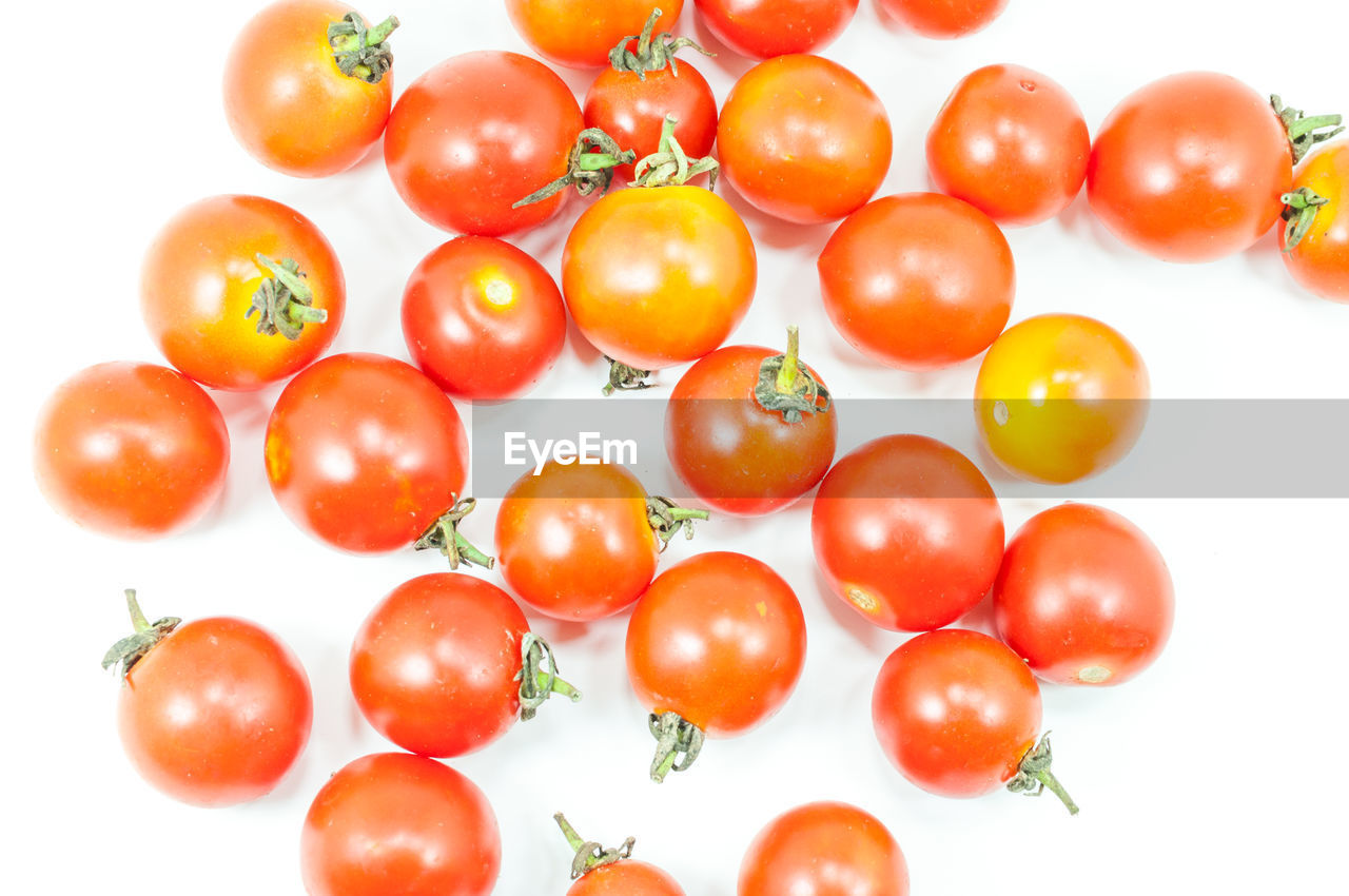 DIRECTLY ABOVE SHOT OF TOMATOES ON CHERRY