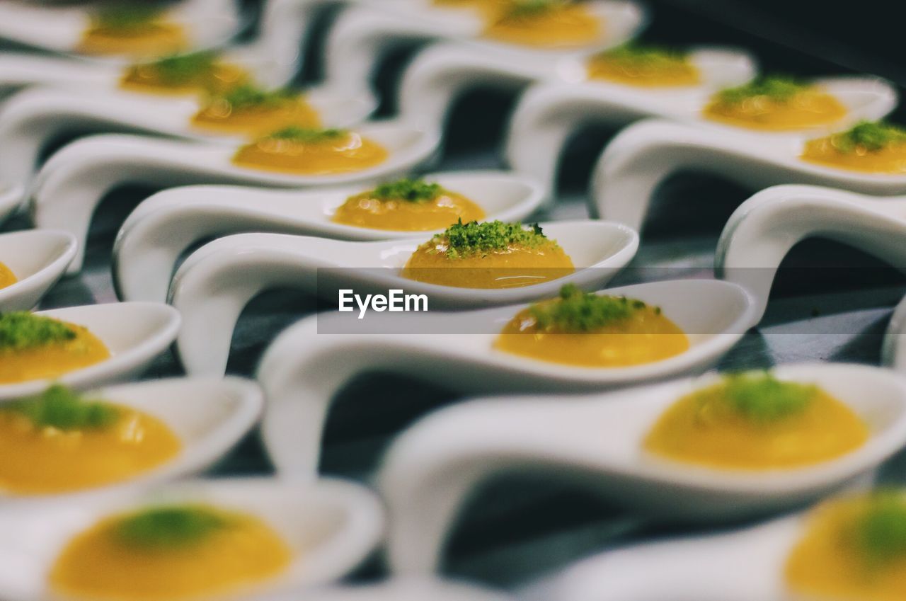 Full frame shot of food in spoons