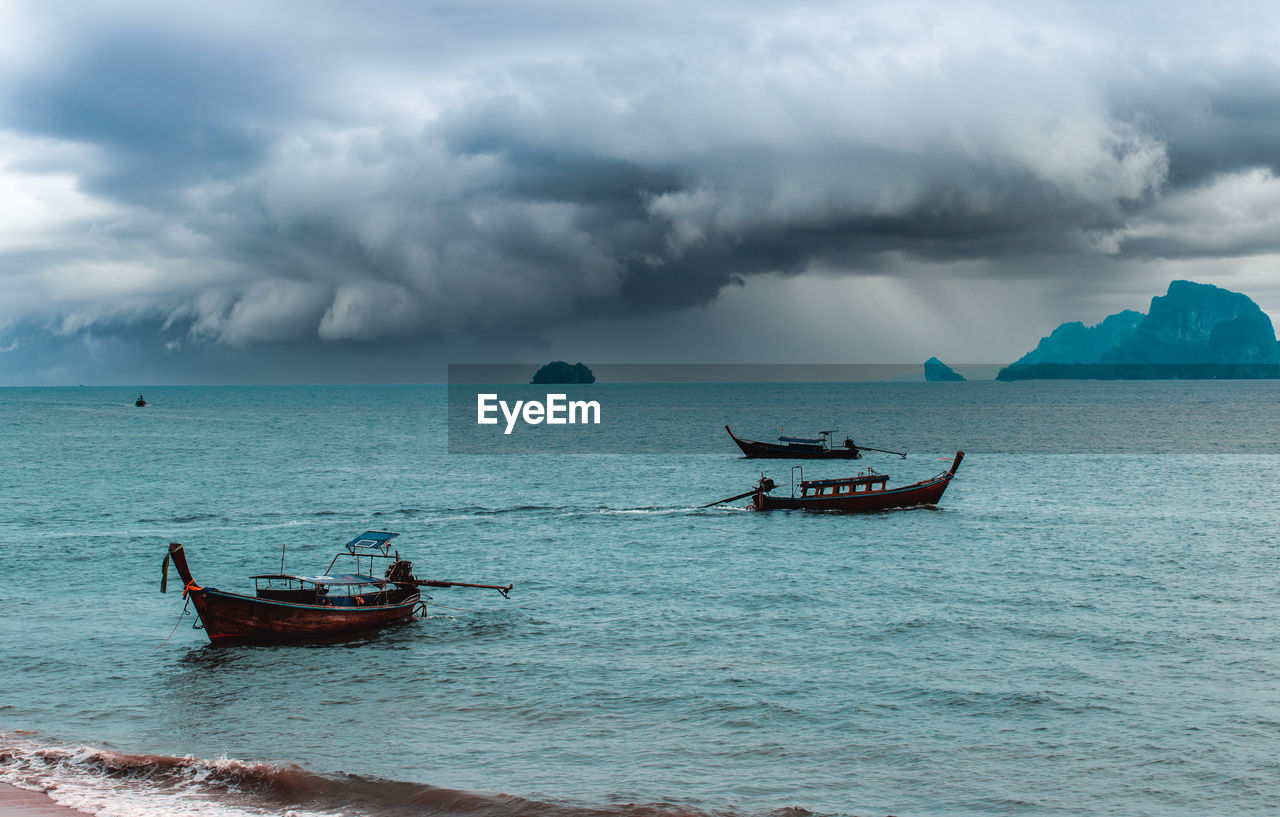 NAUTICAL VESSEL IN SEA AGAINST SKY