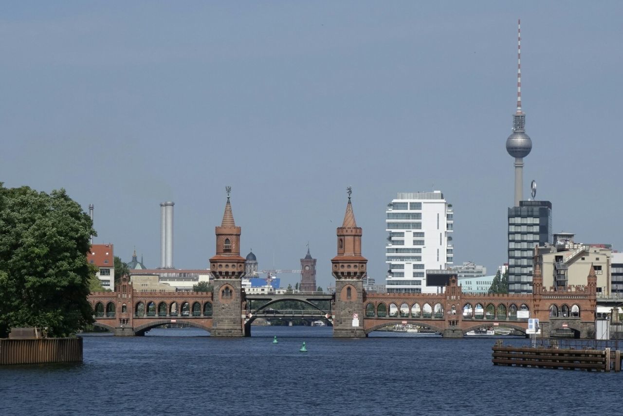 Fernsehturm against sky in city