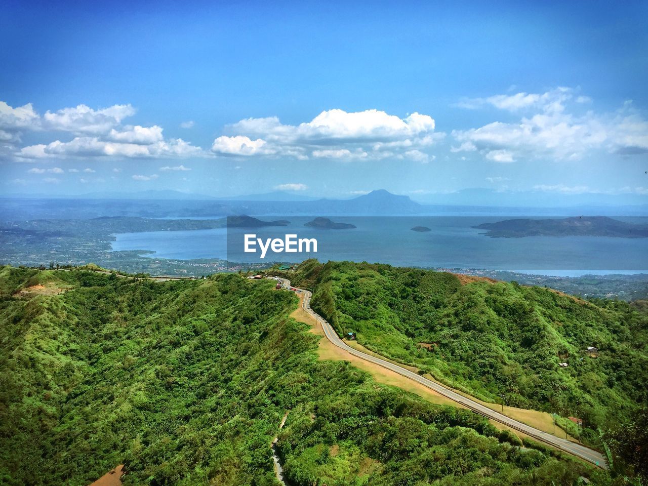 Scenic view of landscape against cloudy sky