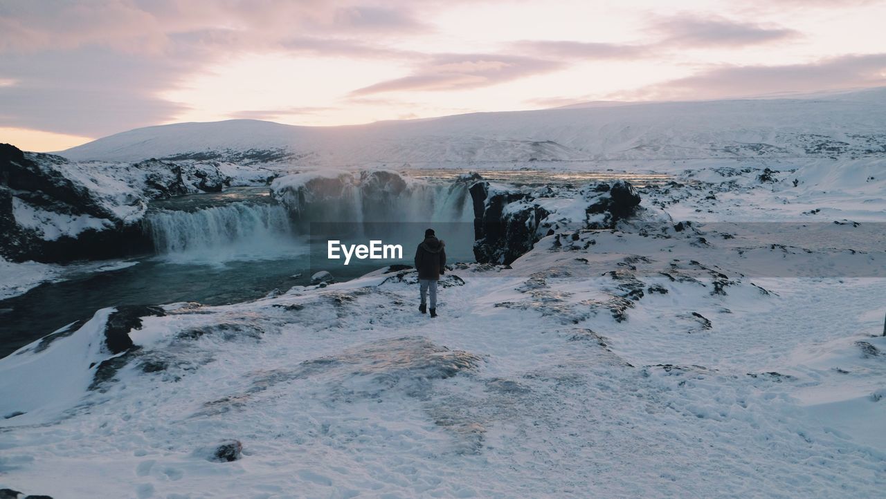 Scenic view of snow covered mountains