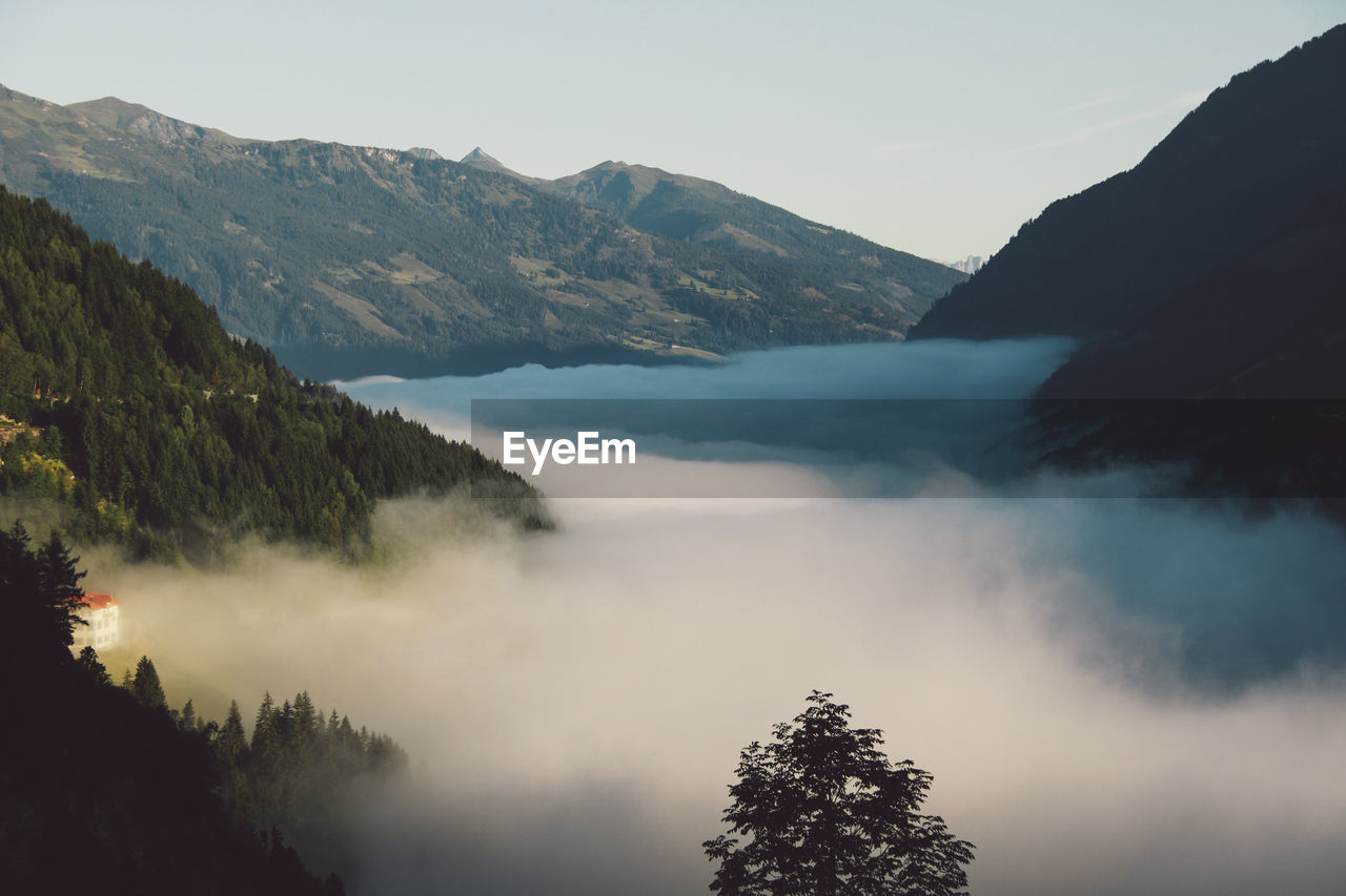 Scenic view of mountains and clouds