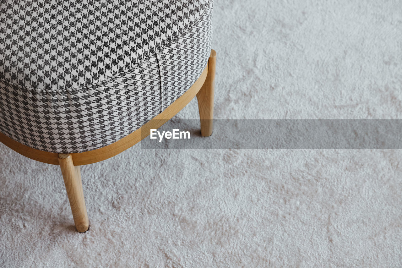 furniture, no people, high angle view, pattern, chair, seat, clothing, indoors, table, still life, hat, wood, textured, day, close-up, absence