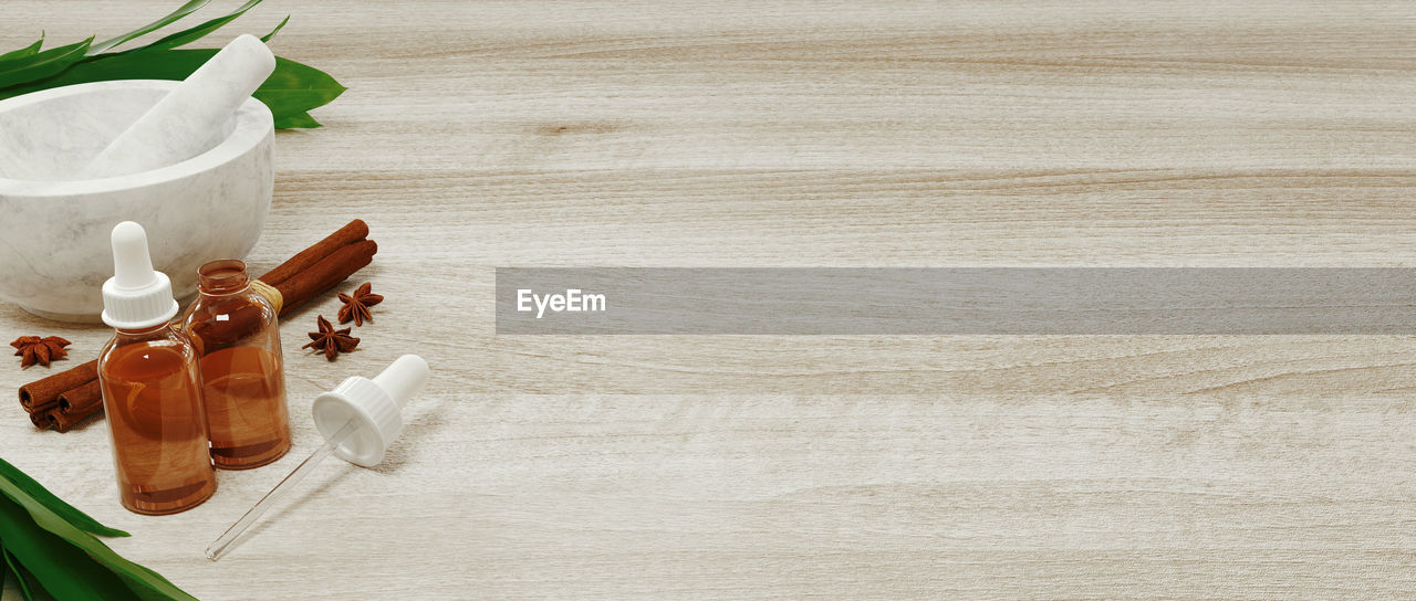 HIGH ANGLE VIEW OF WINE IN GLASS ON TABLE