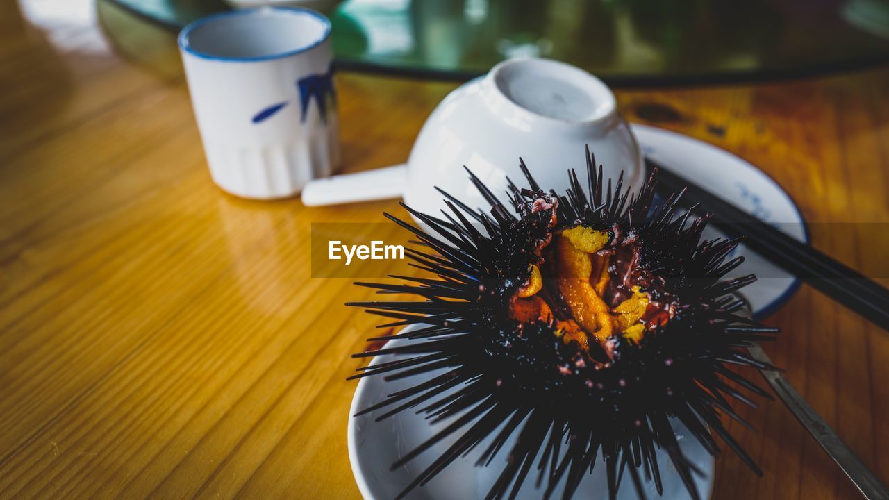 Close-up of sea urchin served on table
