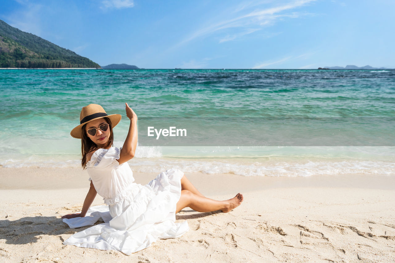 Portrait of young woman on beach