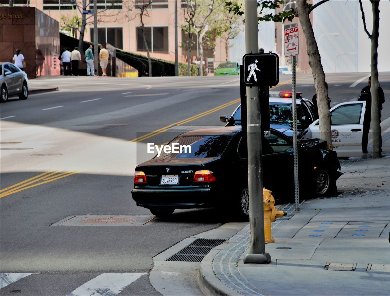 Close-up of car on street