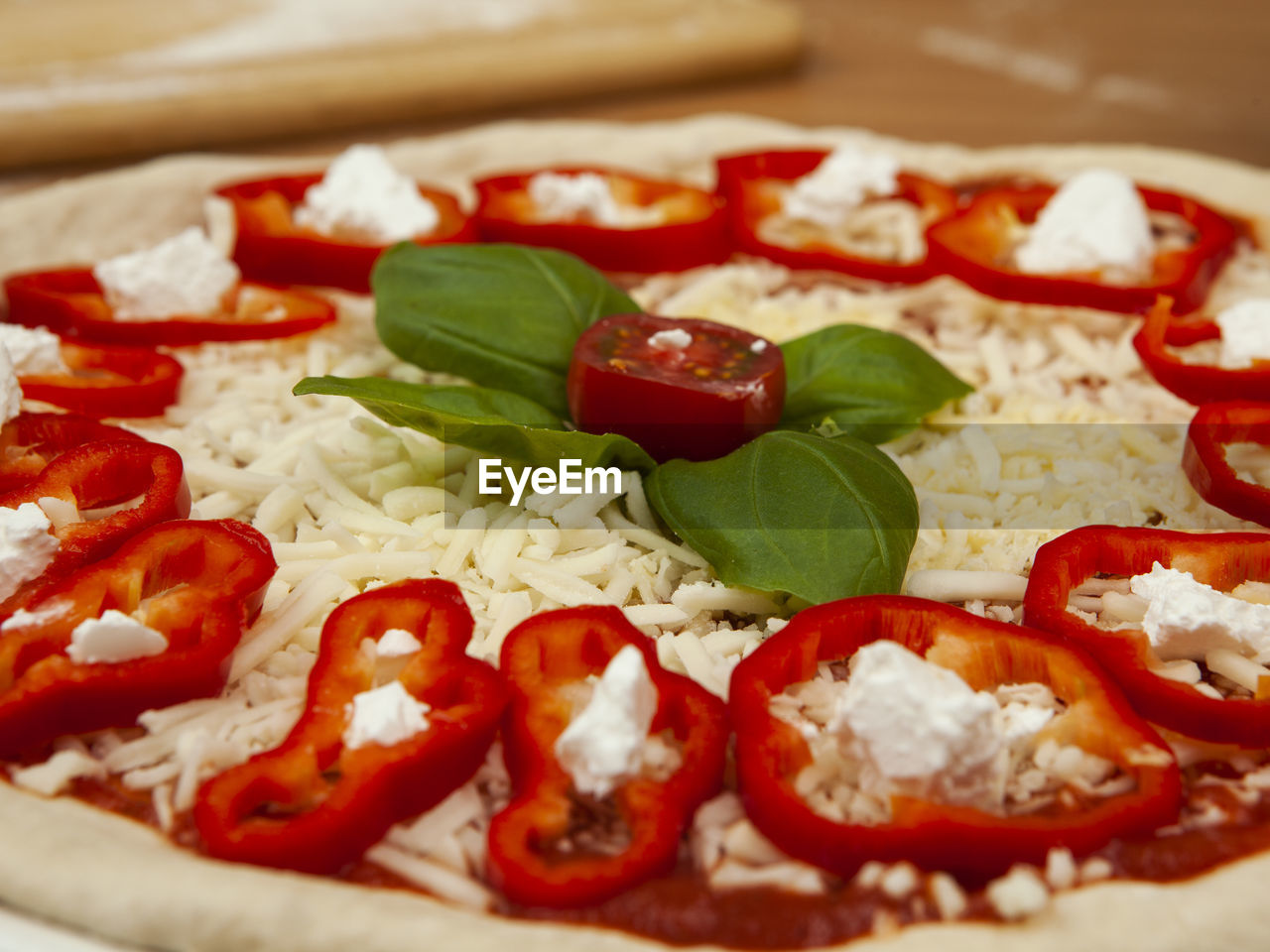 CLOSE-UP OF PIZZA WITH SALAD IN PLATE