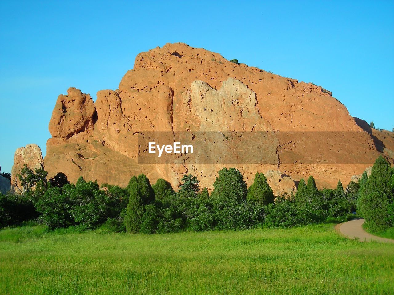 Scenic view of land against clear sky