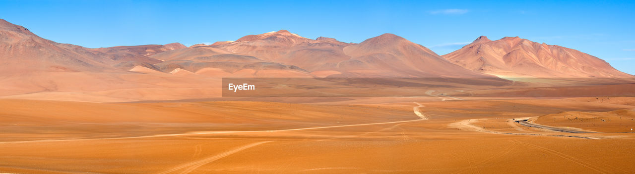 Road and paths in the altiplano at an altitude of 4600m, atacama desert, chile, south america