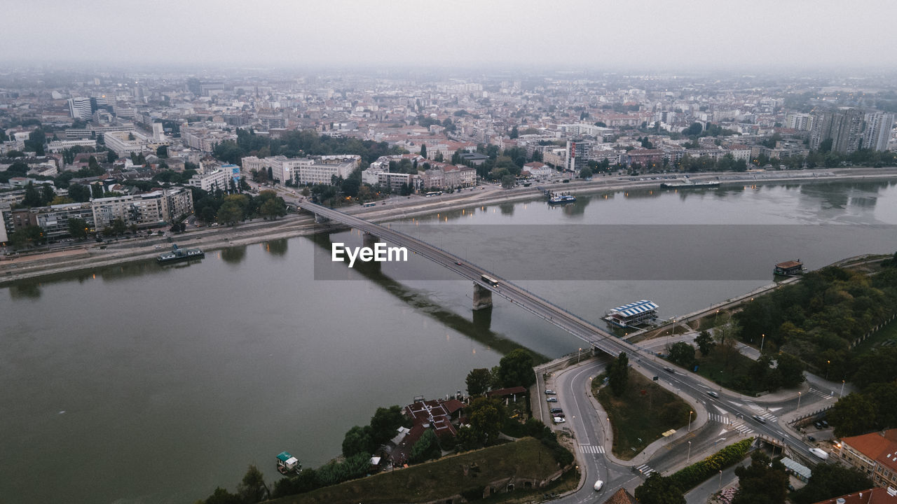 High angle view of river amidst buildings in city of novisad, serbia