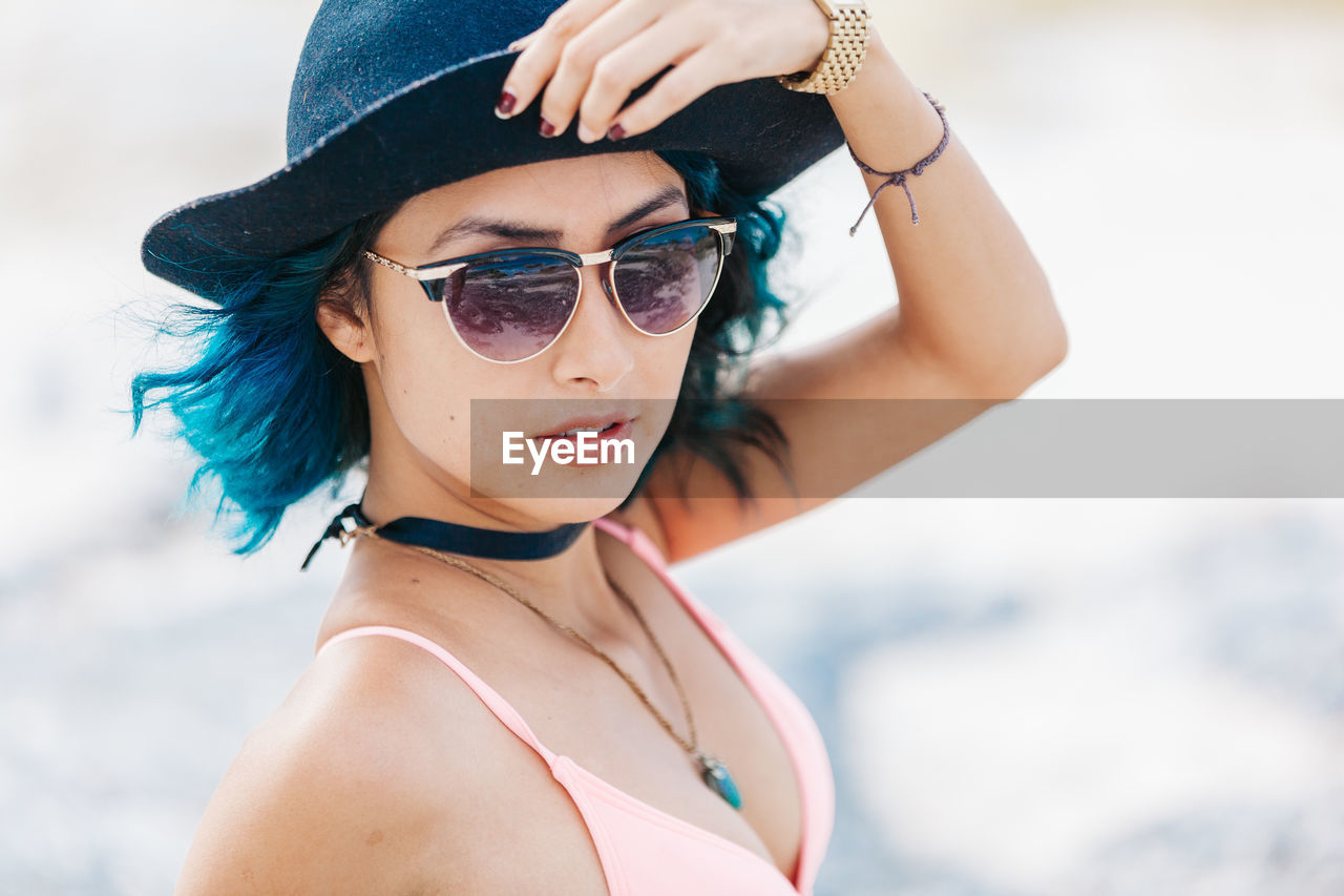 Portrait of woman wearing sunglasses