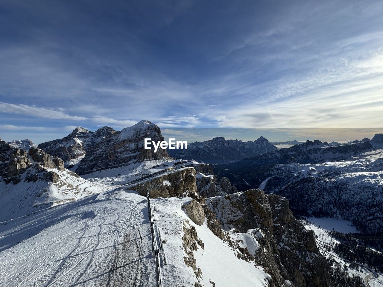 snow, winter, cold temperature, mountain, scenics - nature, environment, sky, landscape, beauty in nature, mountain range, cloud, nature, snowcapped mountain, travel destinations, travel, ridge, blue, no people, tranquility, tranquil scene, outdoors, mountain peak, winter sports, sports, land, forest, white, non-urban scene, tourism, piste, tree, day, frozen