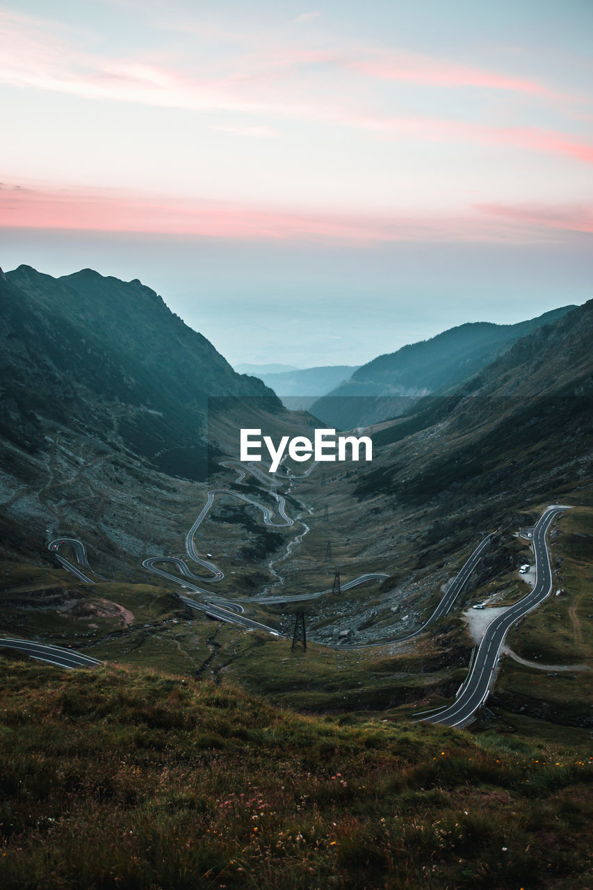 Scenic view of mountains against sky during sunset