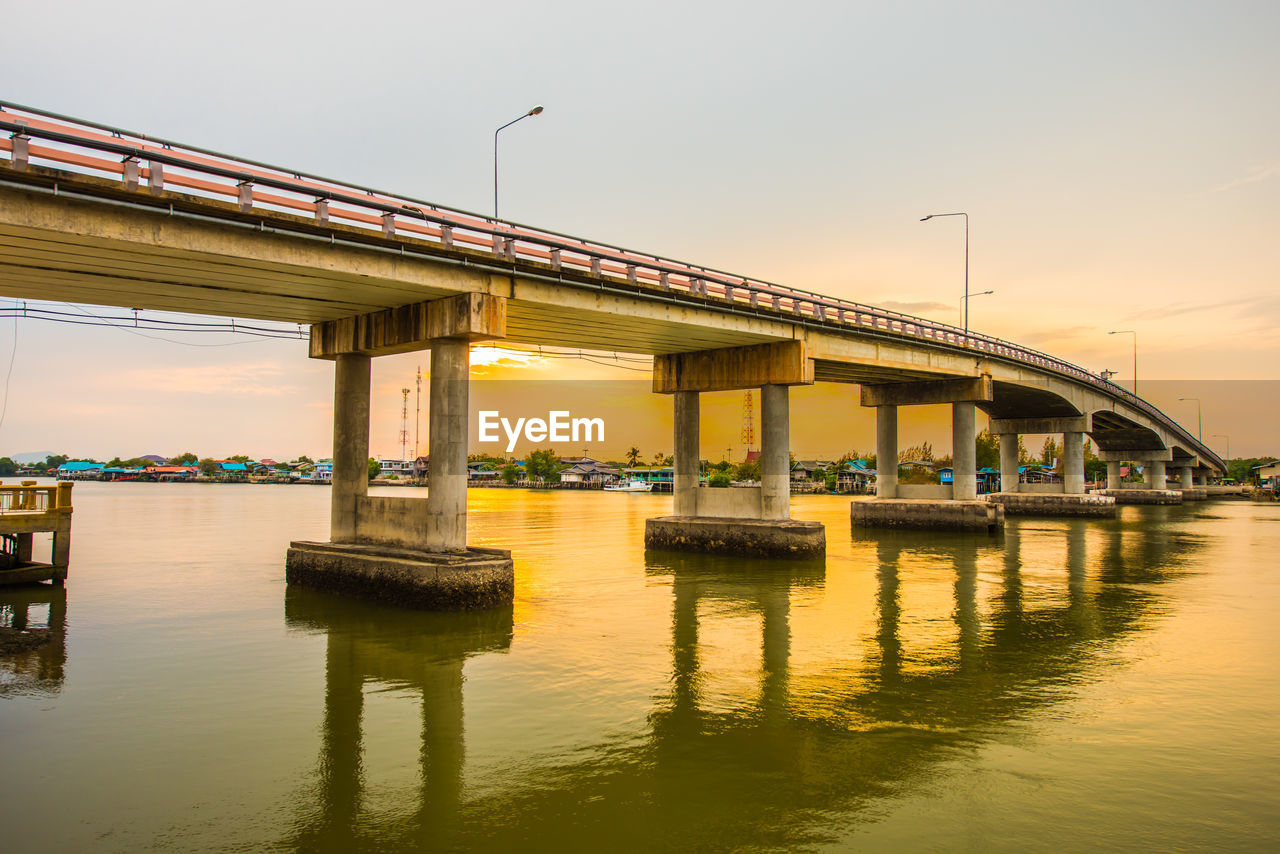 VIEW OF BRIDGE OVER RIVER AGAINST SKY