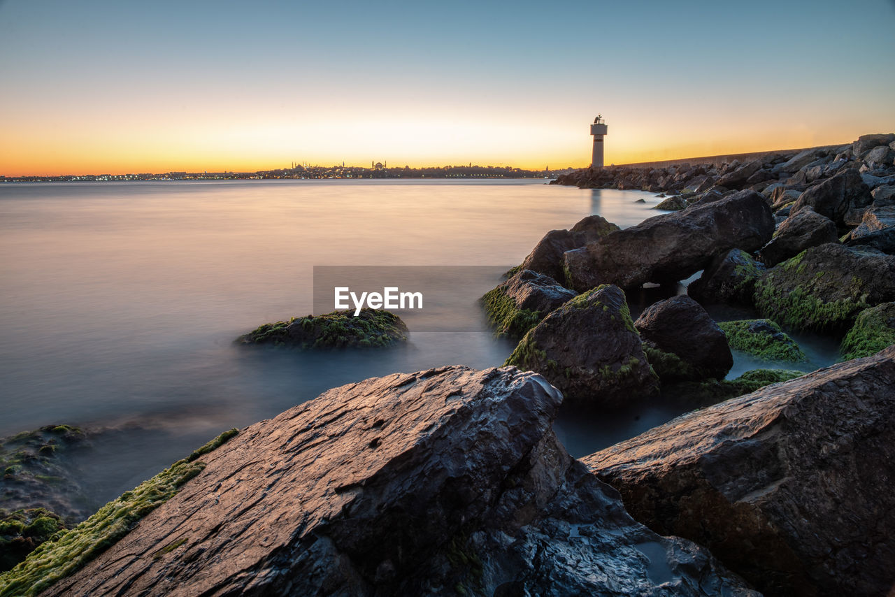 Scenic view of sea against sky during sunset