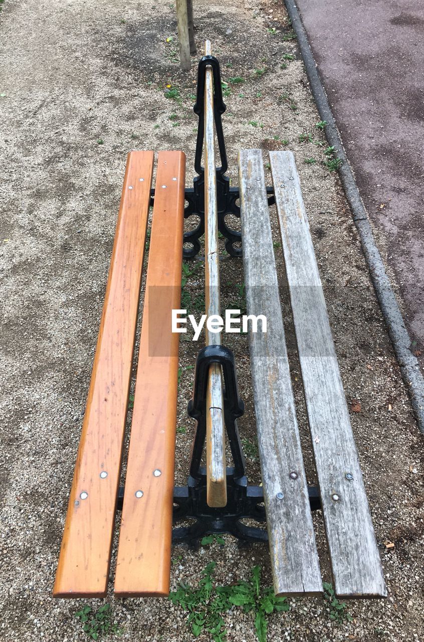 High angle view of empty benches at park