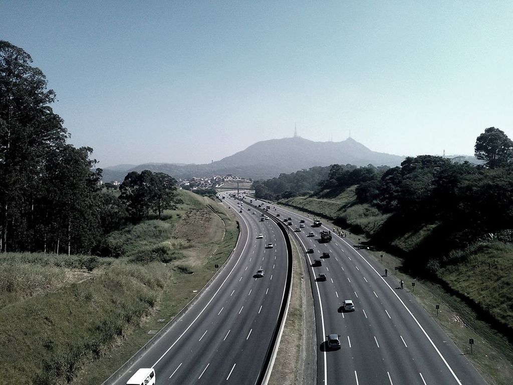 ROAD PASSING THROUGH LANDSCAPE