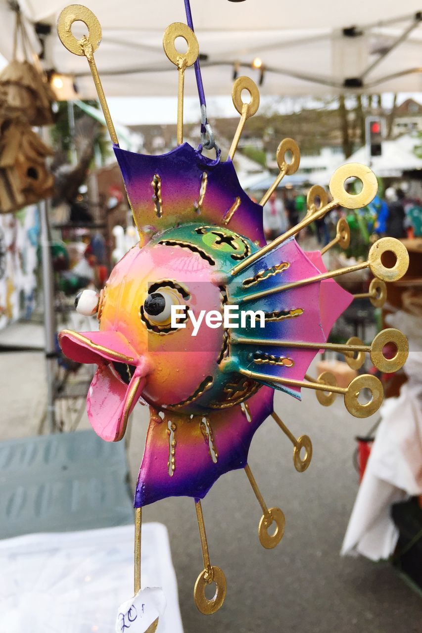 CLOSE-UP OF MULTI COLORED LANTERNS