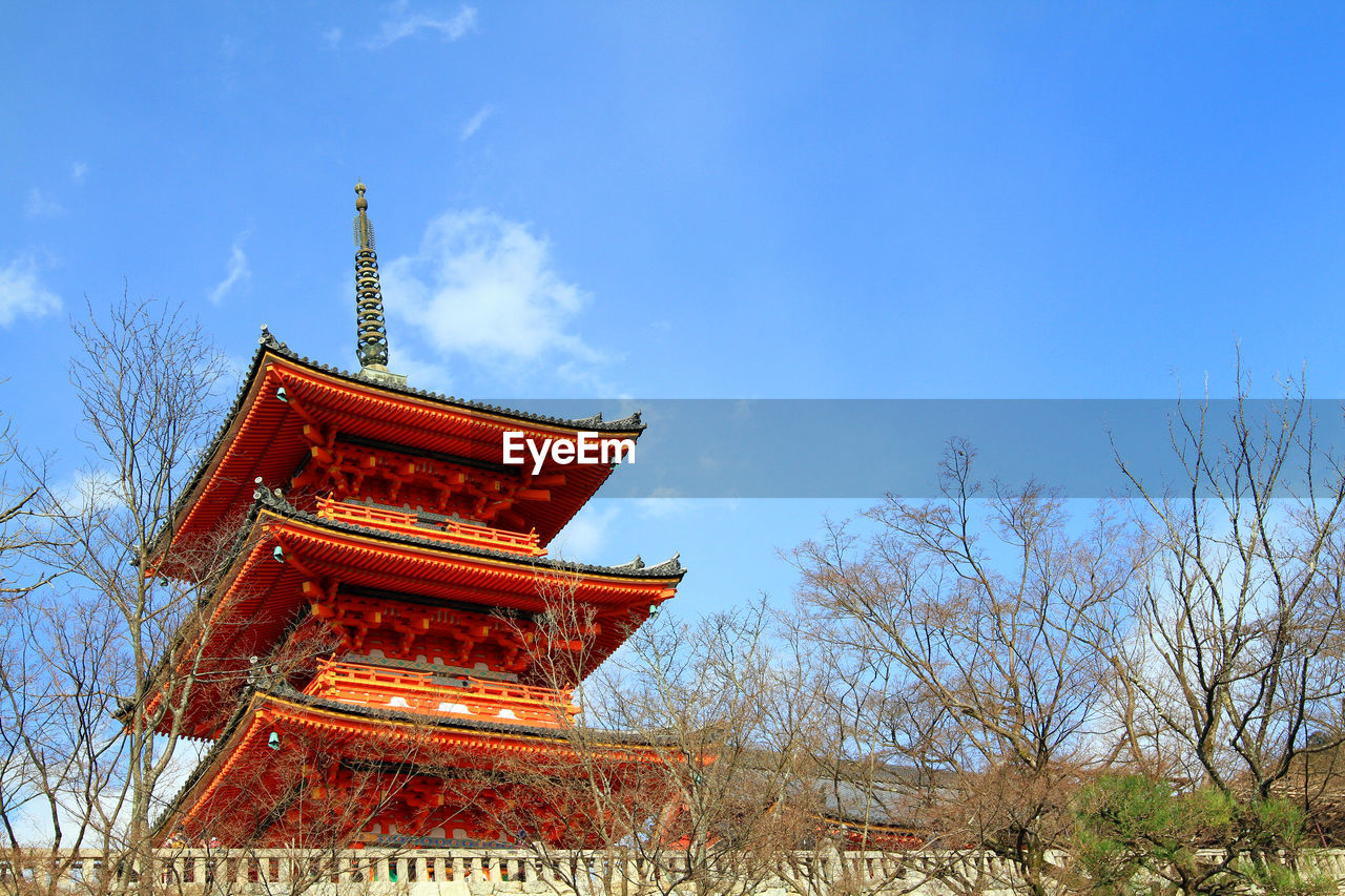 Low angle view of traditional building against sky. red castle in japan