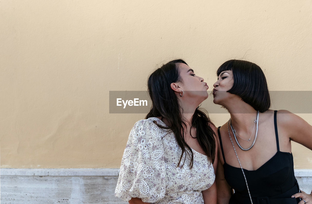 Portrait of two beautiful happy young women